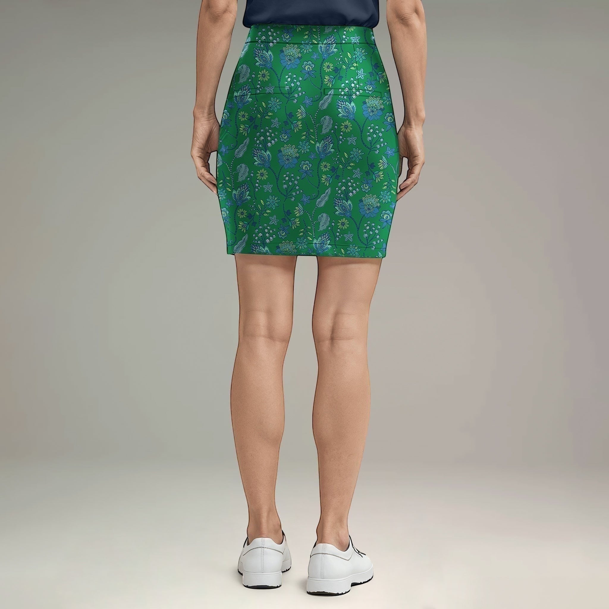 Elliott & Rose Fiori Skort in green with blue floral pattern. Comfortable golf skort with flattering fit.
