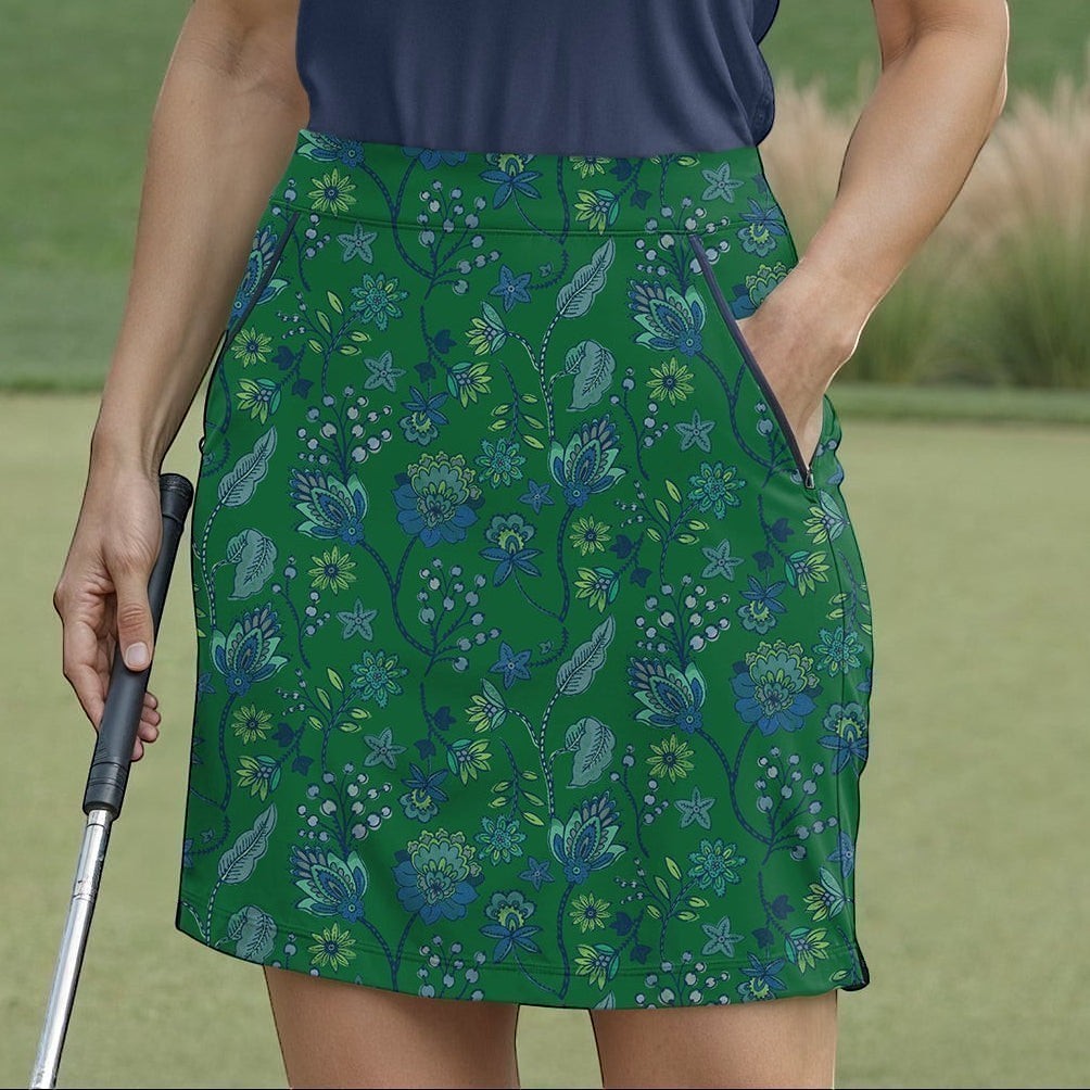 Elliott & Rose green skort with blue and green floral pattern, featuring pockets and a flattering fit for golf.