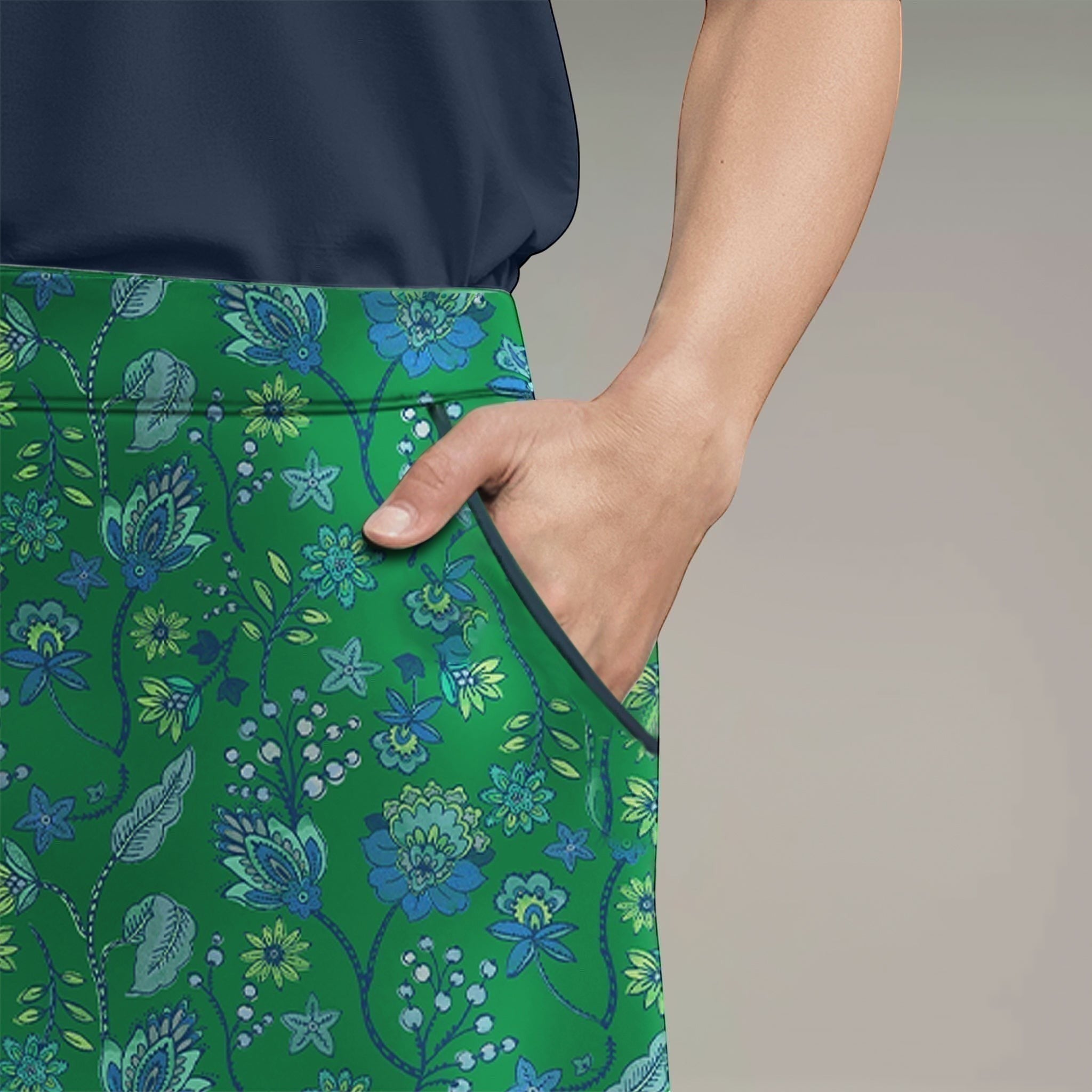 Elliott & Rose Fiori Skort in green with blue floral pattern. Golf skort with pockets.