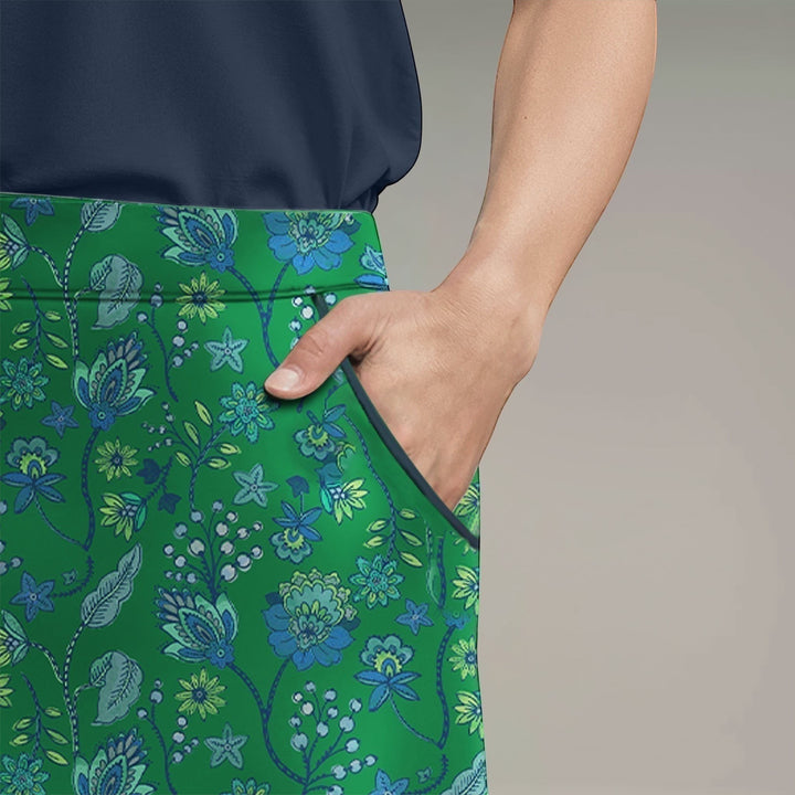 Elliott & Rose Fiori Skort in green with blue floral pattern. Golf skort with pockets.