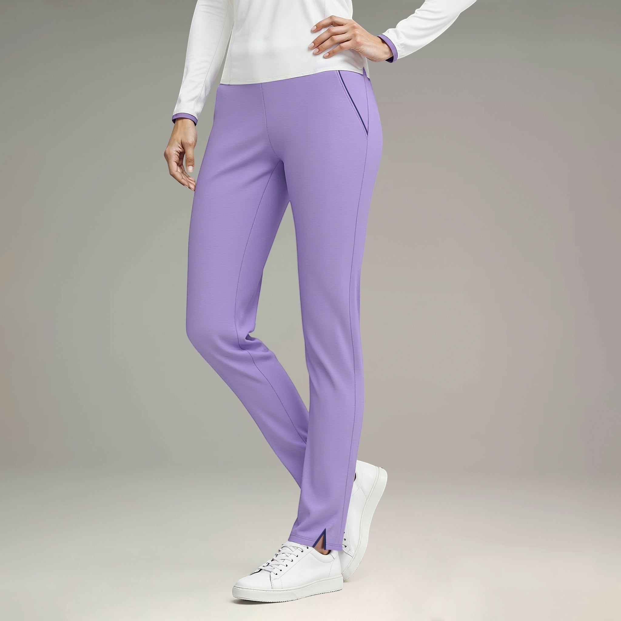 Elliott & Rose lilac performance golf pants with stretch fabric and a sleek, tailored fit. Features subtle side pocket detail and ankle slits.