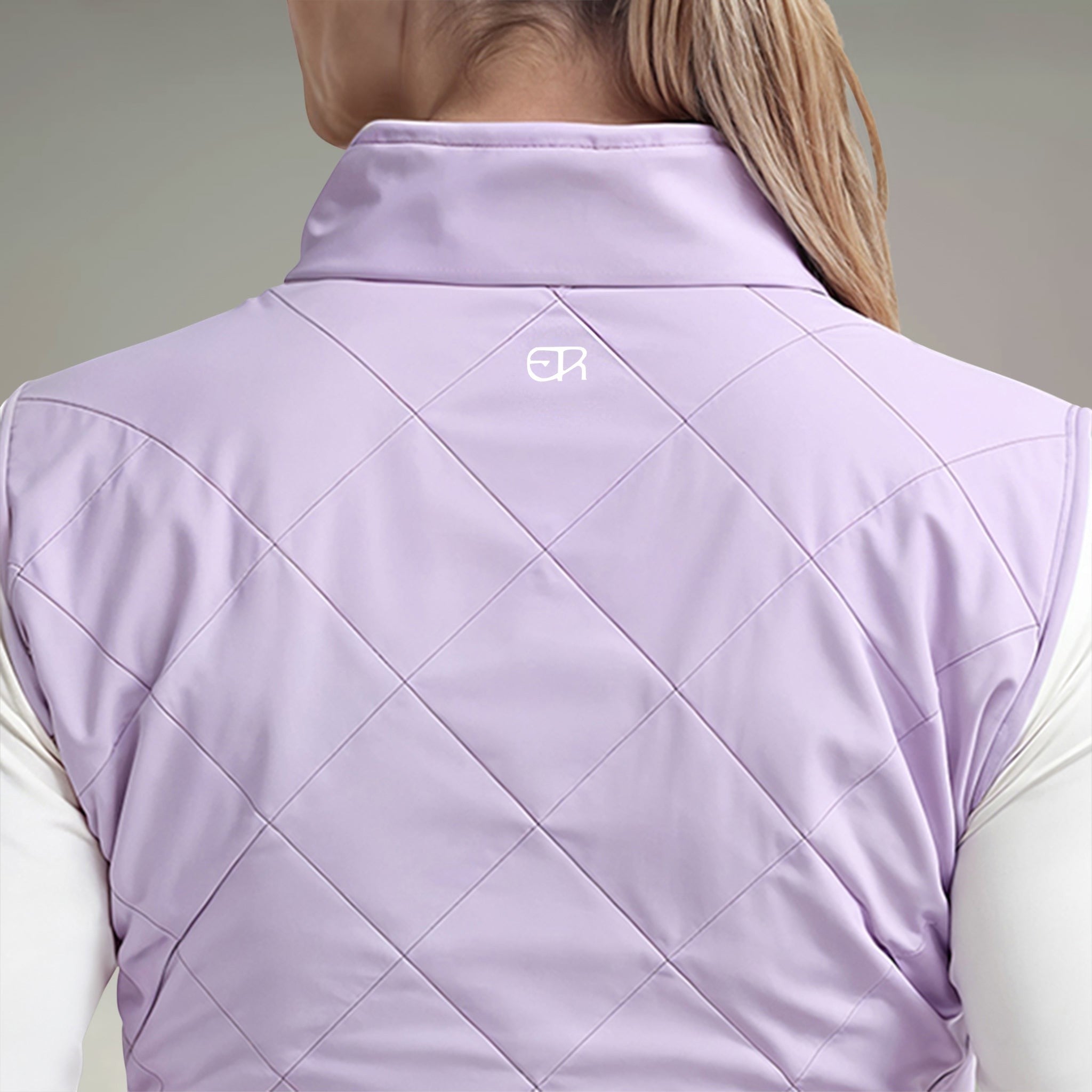 Elliott & Rose lilac quilted golf vest for women with a tailored fit and full range of motion.