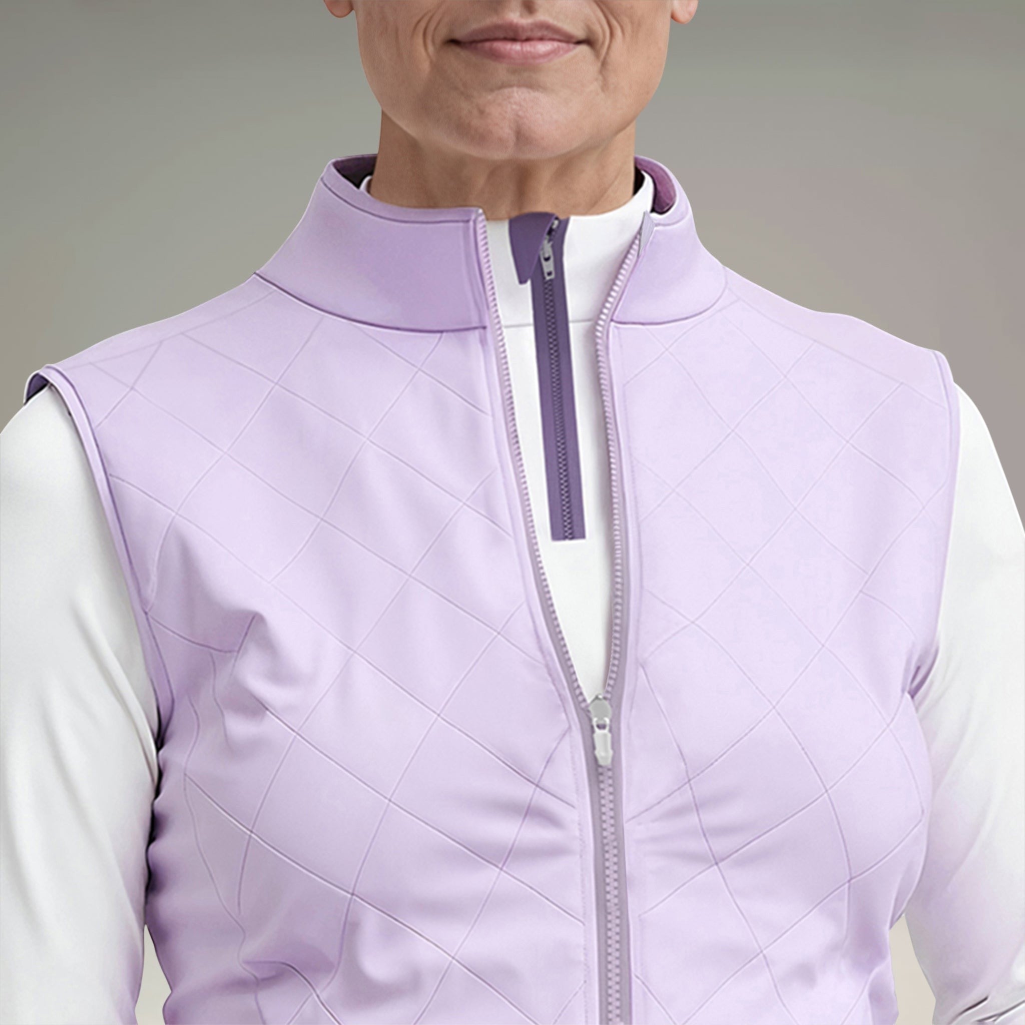 Elliott & Rose women's lilac quilted golf vest with a stand-up collar and full zip closure.
