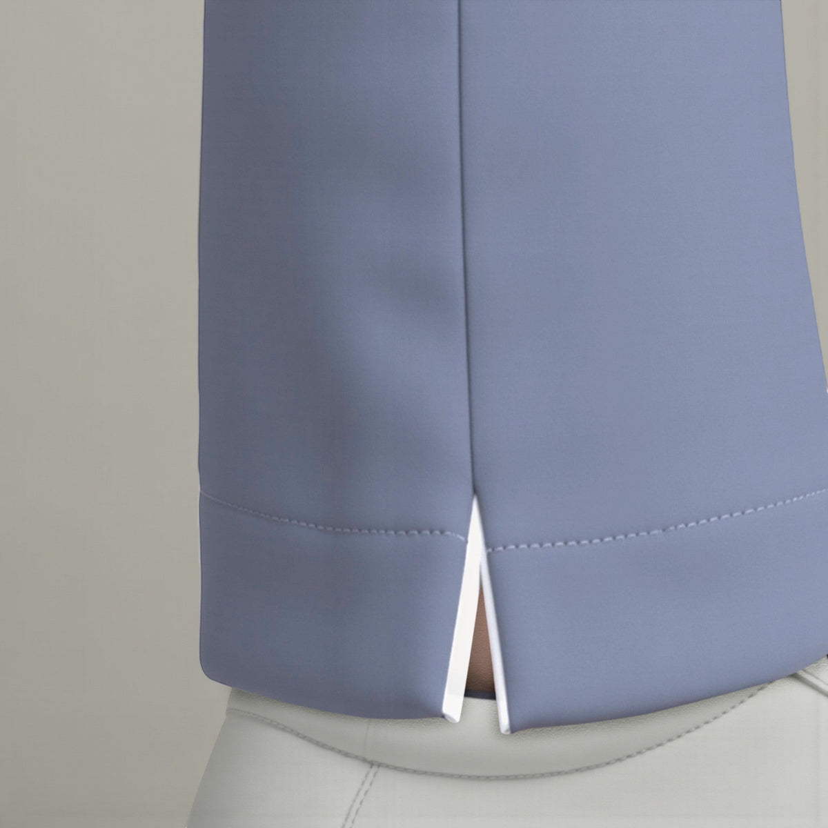 Elliott & Rose cornflower blue performance golf pants with stretch-fit fabric and side vents.