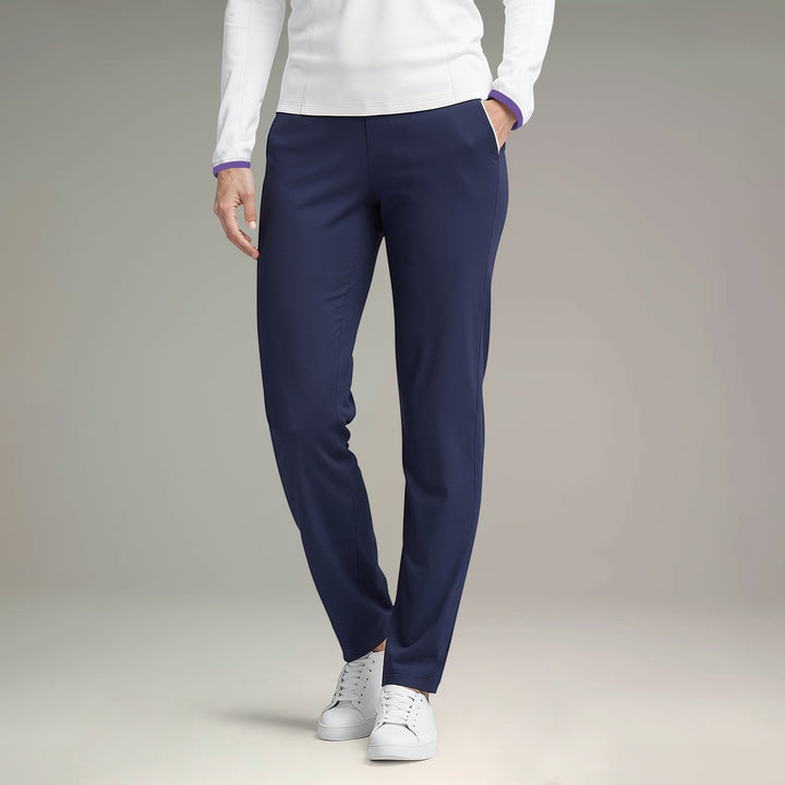 Elliott & Rose navy four-way stretch golf pants with functional pockets and subtle piping detail.