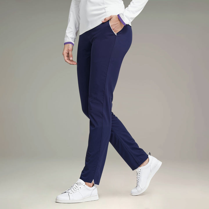 Elliott & Rose navy four-way stretch golf pants with white piping on pockets and ankle, 28" inseam.