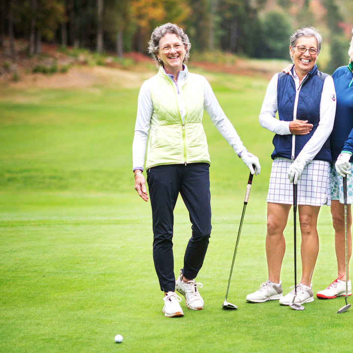 Elliott & Rose navy four-way stretch golf pants with sleek fit and subtle pocket piping.