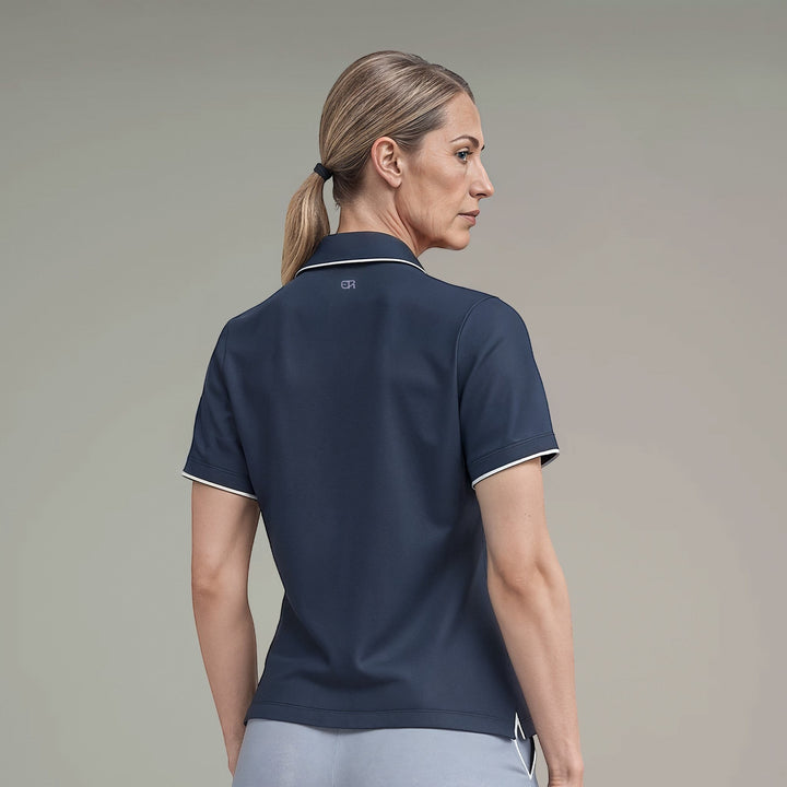 Elliott & Rose navy performance golf polo shirt with white trim and ER logo on back. Breathable, moisture-wicking fabric.