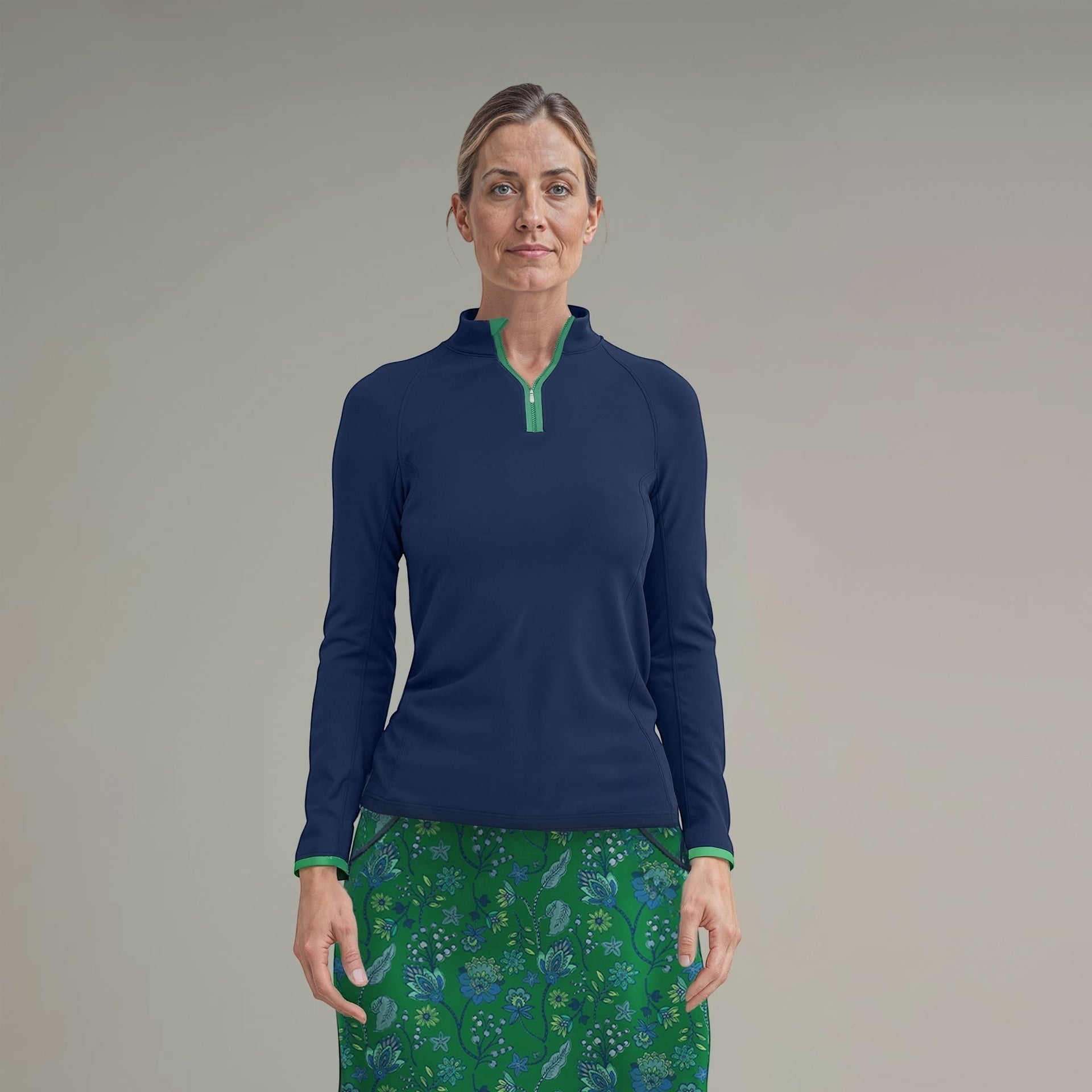 Elliott & Rose navy performance quarter zip pullover with green accents, long sleeves, and breathable fabric for golf.