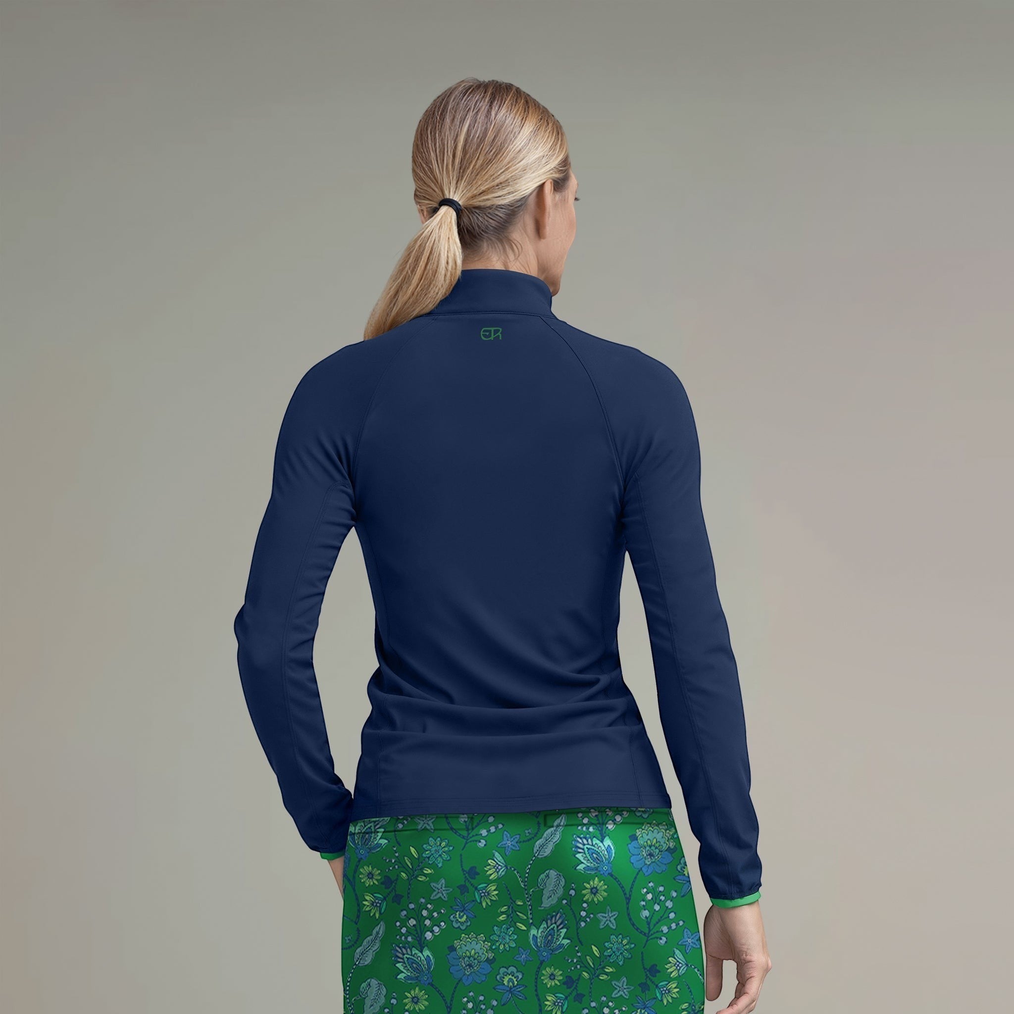 Elliott & Rose navy performance quarter zip pullover with green accents and long sleeves, ideal for golf.
