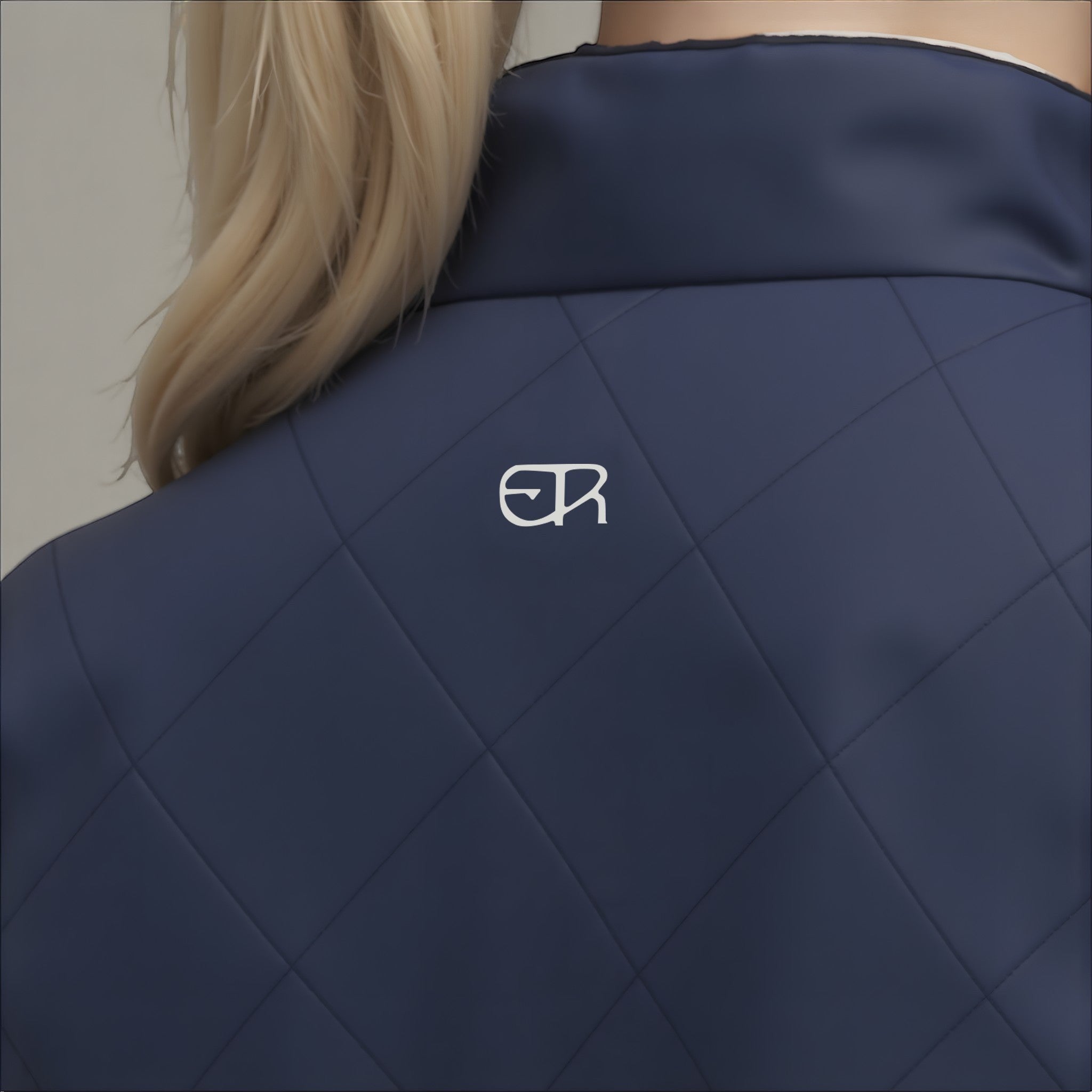 Elliott & Rose navy quilted golf vest with diamond pattern and embroidered logo.