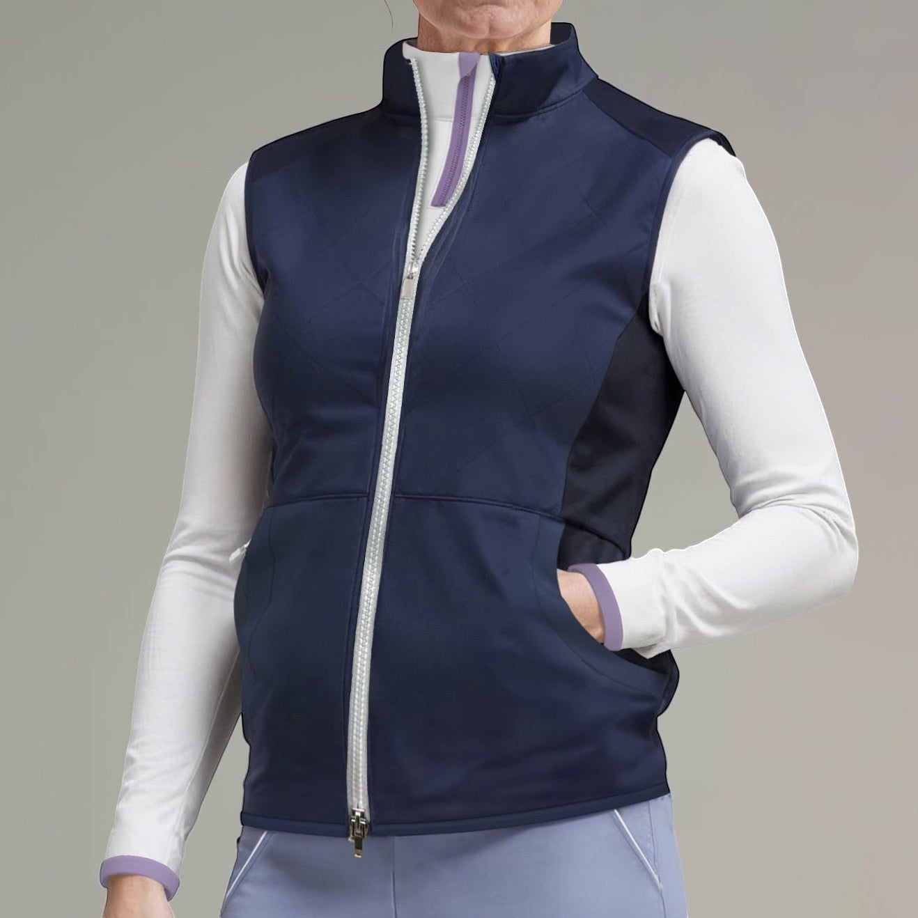 Elliott & Rose navy quilted golf vest with diamond pattern, full zip, and side panels for movement.