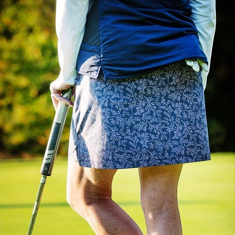 Elliott & Rose navy skort with white vine print, designed for golf. Lightweight and comfortable.
