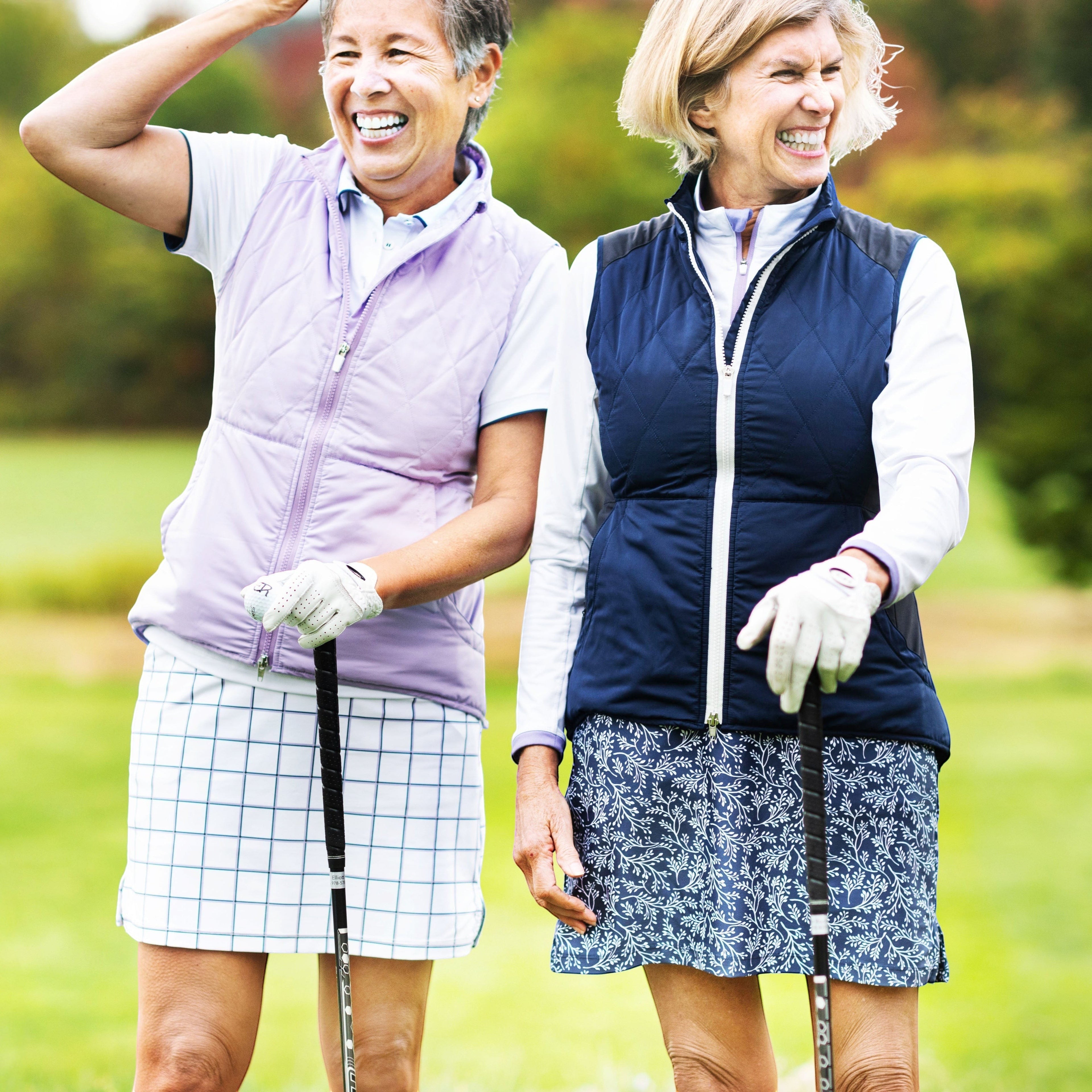 Elliott & Rose navy skort with white vine print, lightweight and comfortable for golf.