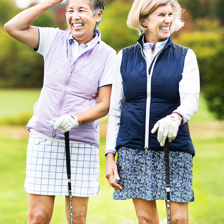 Elliott & Rose navy skort with white vine print, lightweight and comfortable for golf.