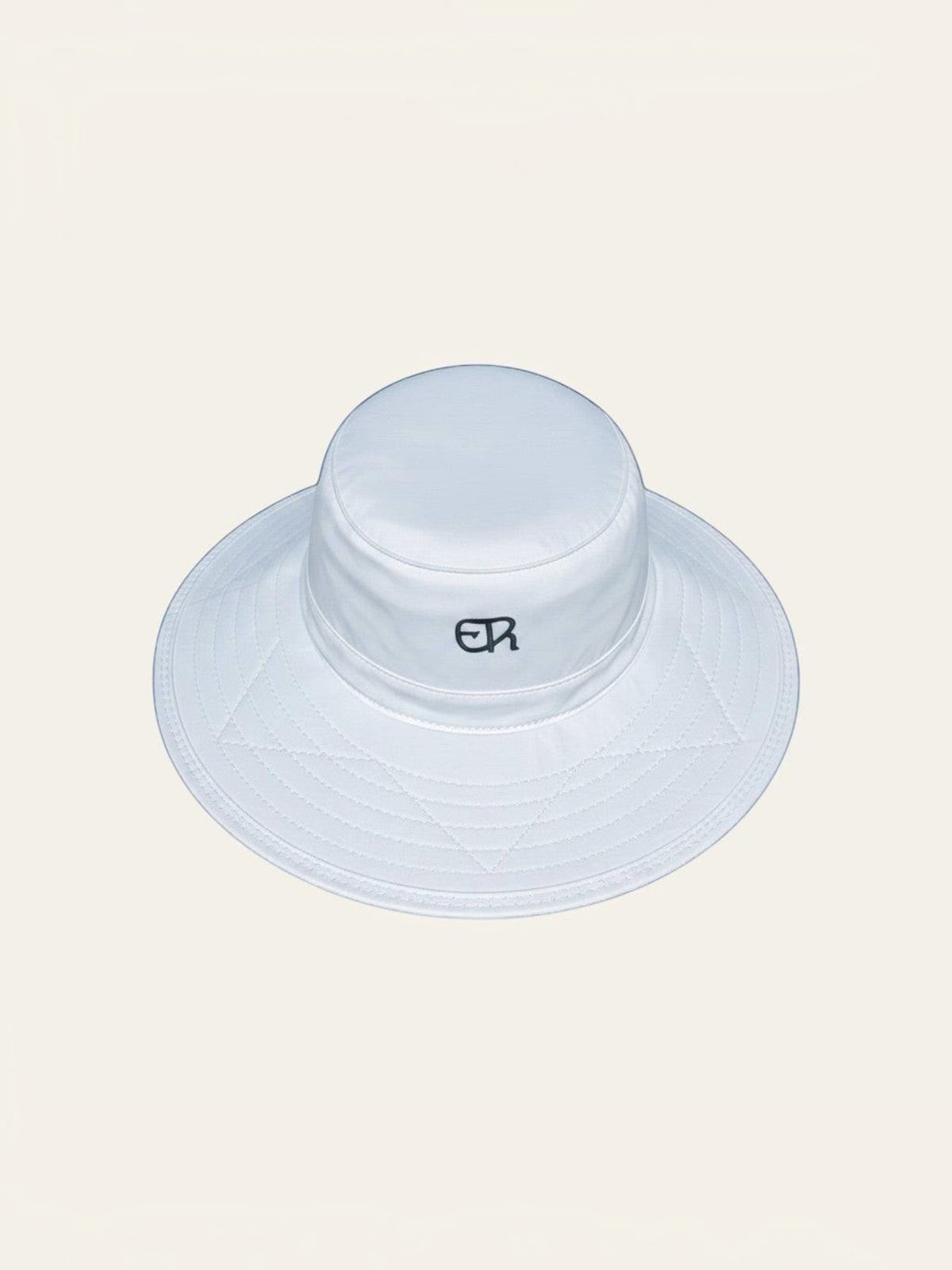 Elliott & Rose white nylon bucket hat with green ER logo and stitched brim, UPF 50+ protection.