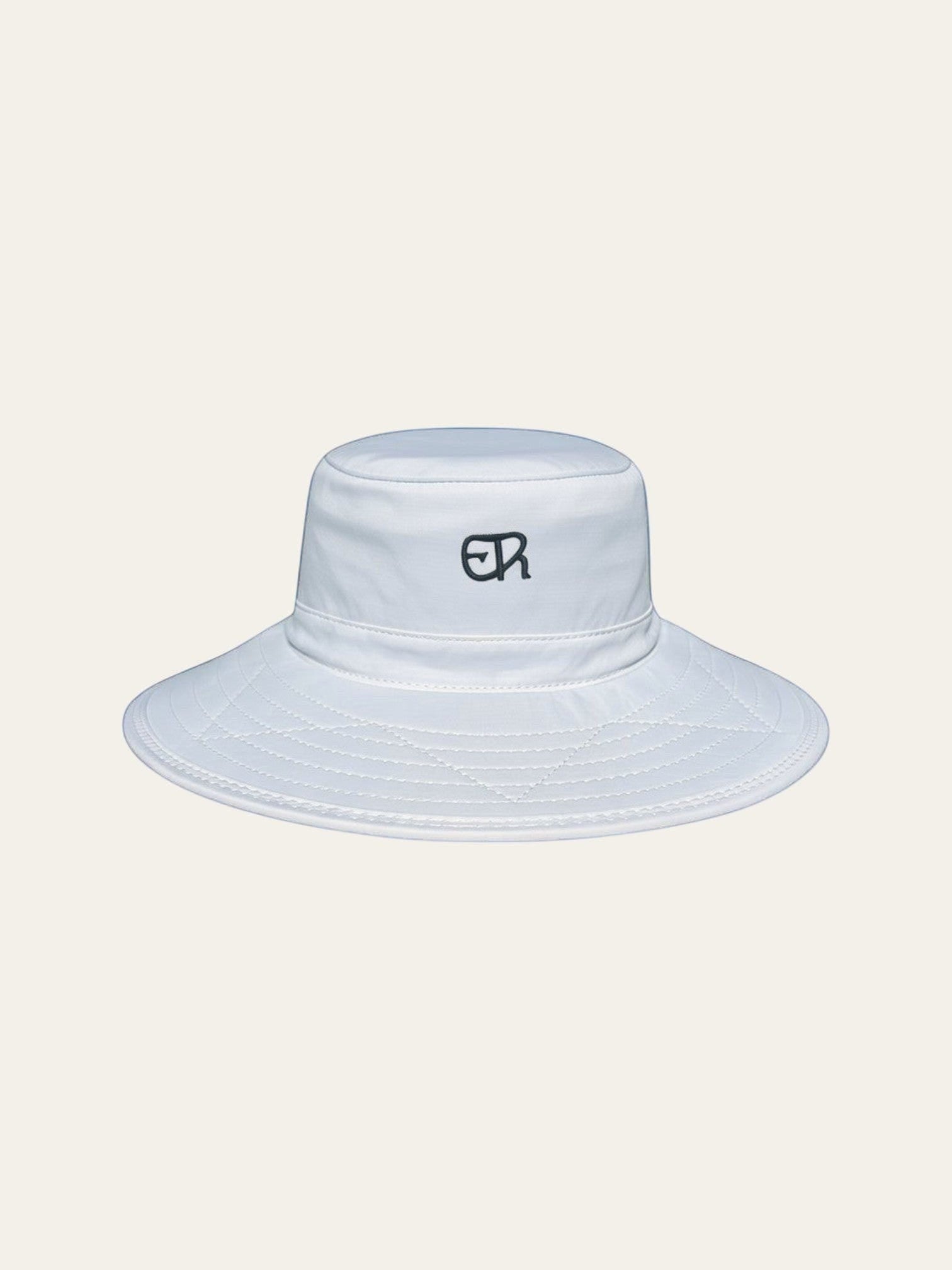 Elliott & Rose white nylon bucket hat with green ER logo, UPF 50+, adjustable chinstrap.