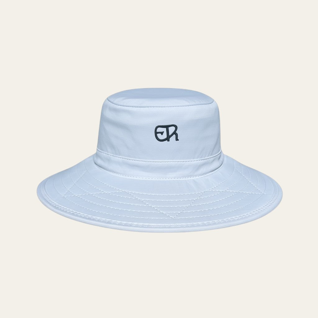 Elliott & Rose white nylon bucket hat with green ER logo, UPF 50+, adjustable chinstrap.