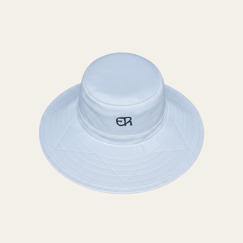 Elliott & Rose white nylon bucket hat with green ER logo and stitched brim, UPF 50+ protection.