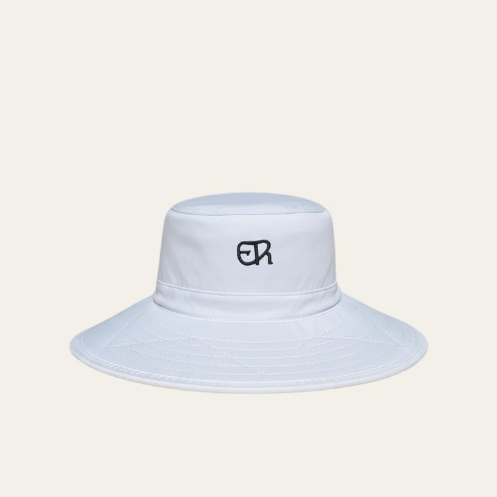 Elliott & Rose white nylon bucket hat with green ER logo, UPF 50+, adjustable chinstrap.