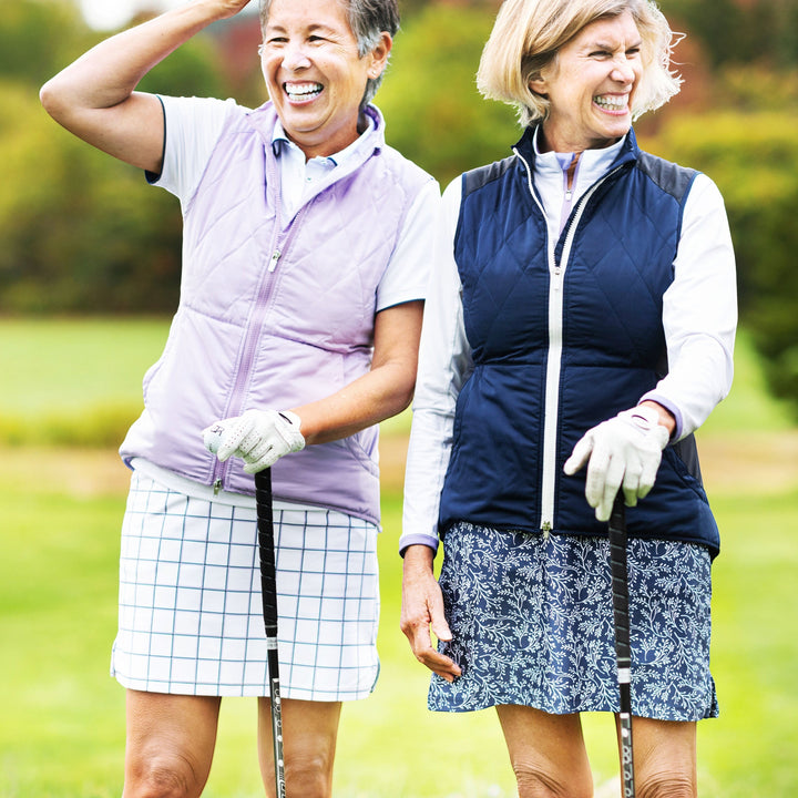 Elliott & Rose white windowpane golf skort with elastic waist and four pockets, 17" length.